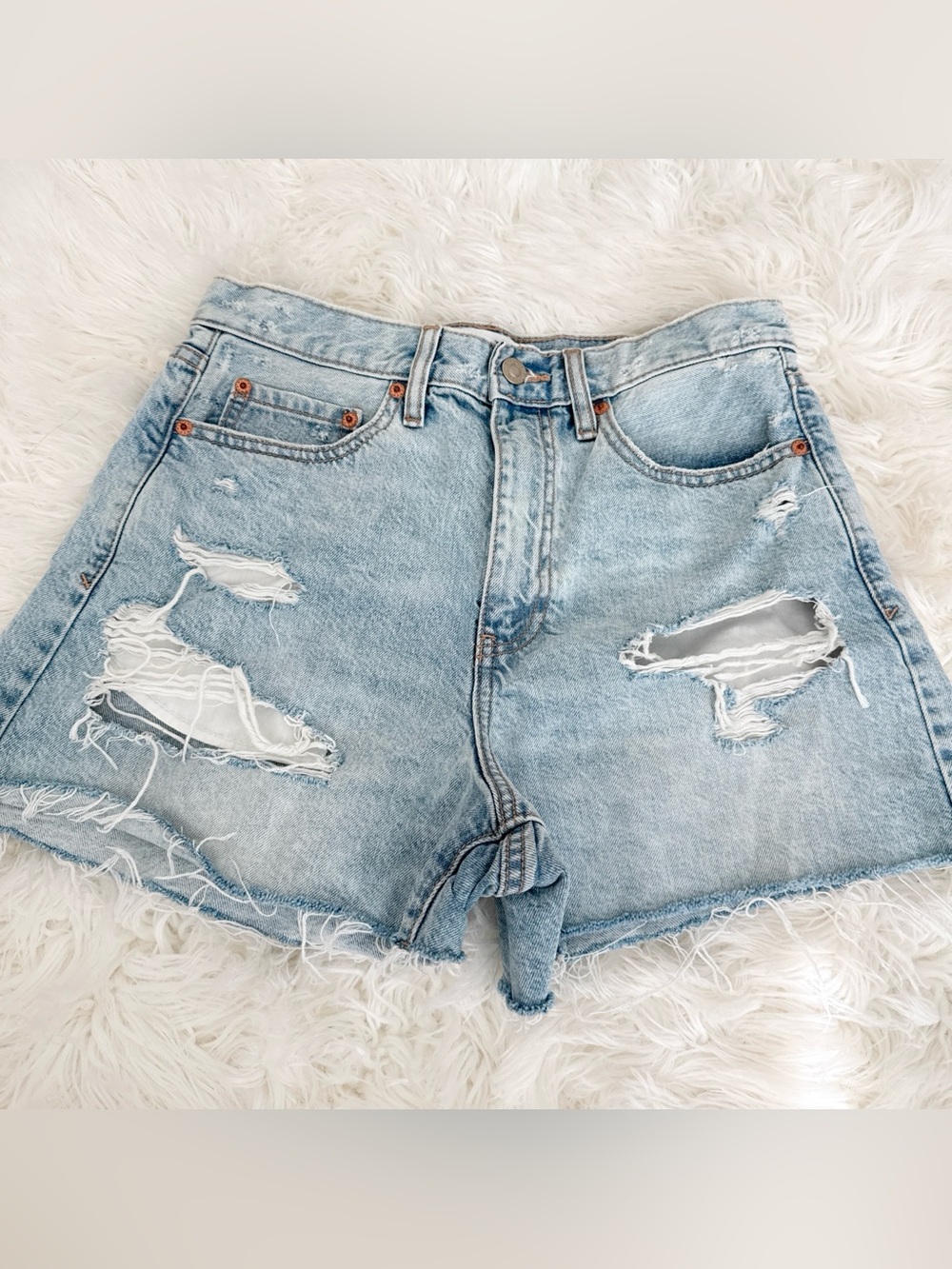High-Rise Light Blue Distressed Denim Shorts